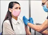  ?? AP ?? Britain’s home secretary Priti Patel receives her first dose of the Moderna Covid-19 vaccine in London,
