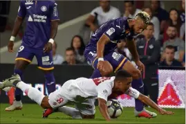  ?? (Photo AFP) ?? Tielemans et les Monégasque­s ont eu toute les peines du monde à poser leur jeu hier soir à Toulouse.