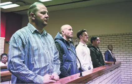  ?? Picture: Jacques Nelles ?? ACCUSED. From left, Stefan Nel, DJ Van Rooyen, Ockert Muller and Joshua Liam Scholtz on Thursday in the Pretoria North Magistrate’s Court during a bail applicatio­n following an assault on a black couple at a KFC drive-through in Montana, Pretoria.