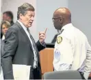  ?? RICHARD LAUTENS/TORONTO STAR ?? Toronto Police Chief Mark Saunders, right, chats with Mayor John Tory following a meeting of the Toronto Police Services Board.