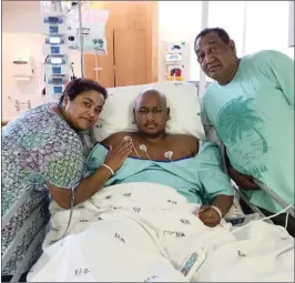  ??  ?? Liam Reddy with his mother Pravashnee and father Trevor after one of his operations.Picture: Supplied