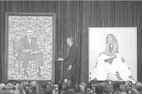  ??  ?? Former president Barack Obama says he felt a personal connection with Kehinde Wiley, the artist who painted his portrait. Former first lady Michelle Obama was wowed by Amy Sherald’s portrait. MARK WILSON/GETTY IMAGES