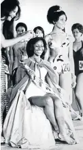  ?? / SUNDAY EXPRESS ?? Miss Africa South 1973 Ellen Peters crowning Evelyn Williams.