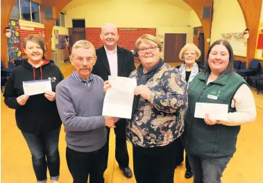  ??  ?? Special awards Lisa Haggerty of CAB, Angela Moohan of The Larder, Kathleen Neilly of West Lothian Foodbank received awards from with Liz Connolly, George Pratt and Dave McLennan of BLES