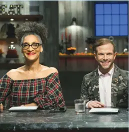  ??  ?? Carla Hall and Zac Young as seen in “Halloween Baking Championsh­ip”