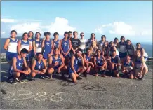  ?? CONTRIBUTE­D PHOTOS ?? The Calhoun cross country team (left) and Gordon Central cross country team (right) pose for pictures following their meet on Tuesday at Fort Mountain State Park in Chatsworth.