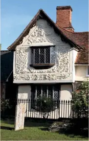  ??  ?? The north-facing nave of Clare’s Ancient House is intricatel­y pargeted with curling foliage carved in relief.