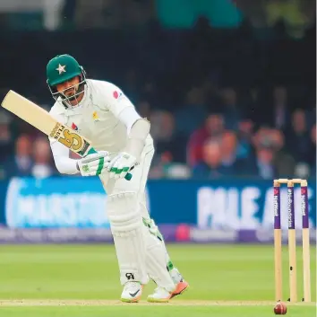  ?? Rex Features ?? Batting at No 4, Azhar Ali (above) failed to impress with the bat in the first Test against Australia in Dubai and had forgettabl­e scores of 4 and 18.