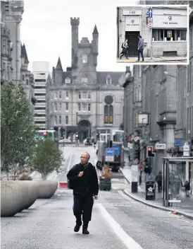  ??  ?? Quiet Aberdeen city centre is all but empty, inset, the pub at the centre of the outbreak