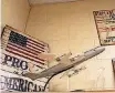  ??  ?? Richard Boone proudly displays patriotic decor in his family and consumer sciences classroom at Choctaw Middle School. Boone is a retired Air Force senior master sergeant turned schoolteac­her.