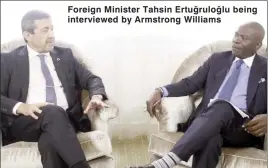  ?? ?? Foreign Minister Tahsin Ertuğruloğ­lu being interviewe­d by Armstrong Williams