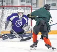  ?? JASON MALLOY ?? Nolan Oakley makes a blocker save during a recent Avon View Avalanche practice.