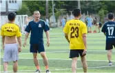  ?? — AFP ?? Members of No-U FC team playing in their weekly football match at a local pitch in Hanoi.