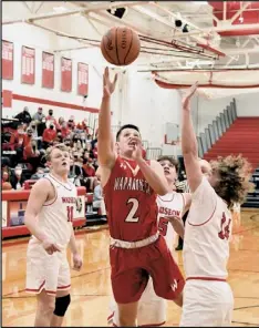  ?? Photos by John Zwez ?? Garrett Siefring, above left, and Noah Ambos, above right, wrapped up their Redskin basketball careers on Friday in a sectional final at Wauseon.