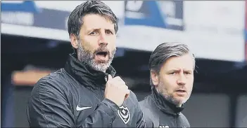  ??  ?? BLUES BROTHERS Danny Cowley, left, and brother Nicky on the Fratton Park touchline