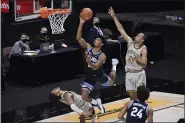  ?? JESSICA HILL — THE ASSOCIATED PRESS ?? Villanova’s Jermaine Samuels, center, is fouled by Boston College’s Makai Ashton-Langford, bottom left, in the second half of the Wildcats’ 76-67 victory over the Eagles in the season opener for both teams.