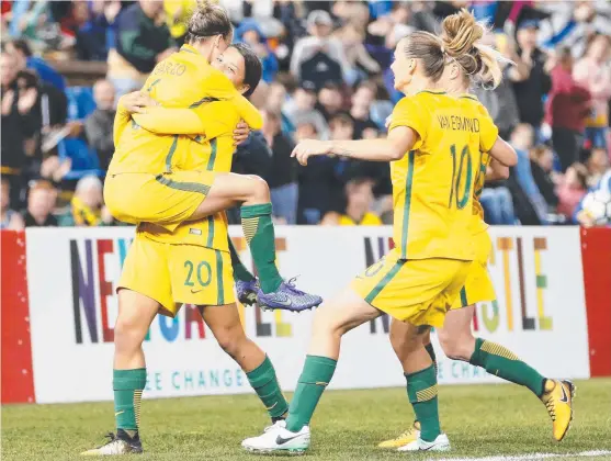  ?? BIG TIME: Sam Kerr of the Matildas celebrates her second half goal with teammates during Australia’s win over Brazil at McDonald Jones Stadium in Newcastle. ??