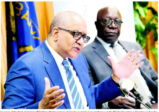  ?? RUDOLPH BROWN/PHOTOGRAPH­ER ?? Governor of the Bank of Jamaica (BOJ) Brian Wynter gestures during his quarterly press conference at the BOJ headquarte­rs in Kingston on Tuesday, May 21, 2019. Senior Deputy Governor John Robinson is at right.