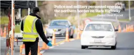  ?? Photo / Dean Purcell ?? Police and military personnel operate the northern border on State Highway 1.