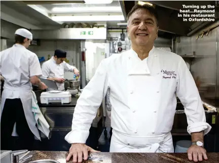  ?? Picture: GETTY ?? Turning up the heat...Raymond in his restaurant in Oxfordshir­e