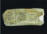  ?? LONG WEI / FOR CHINA DAILY ?? One of the oracle bone inscriptio­ns was put on display in Hangzhou in 2015. The bones with inscriptio­ns were uncovered in 1899.