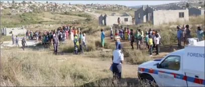  ?? Picture: FILE ?? FLASHBACK: The scene where two women’s bodies were found among the houses left unfinished in NU6 Mdantsane, which was said to have become a haven for criminals. BCM has now restarted the project.