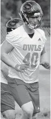  ?? CARLINE JEAN/SUN SENTINEL ?? FAU tight end Harrison Bryant executes a drill during the first day of football practice in Boca Raton.