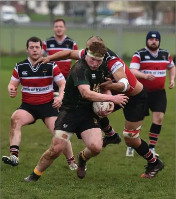  ??  ?? Padraic Mongey of Moyne ties to break through against Wicklow.