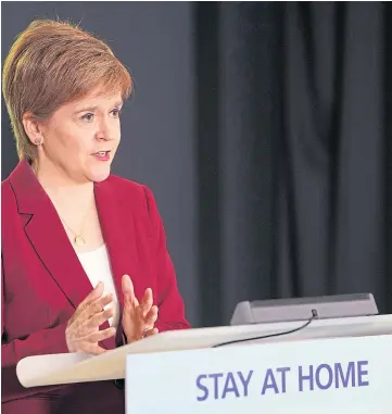  ??  ?? PLEA: First Minister Nicola Sturgeon at the Scottish Government briefing yesterday.