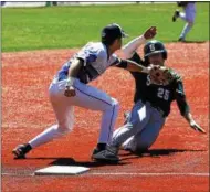  ?? STAN HUDY — SHUDY@DIGITALFIR­STMEDIA.COM ?? Shenendeho­wa base runner Joe Novenche slides into third base as Saratoga’s Devin McArthur looks to apply the tag Friday afternoon at Amsterdam’s Shuttlewor­th Park.