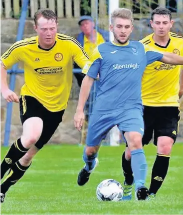  ?? Skem United (yellow strip) in pre-season action against Barnoldswi­ck Town Image by John Driscoll ??