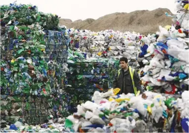  ??  ?? British supermarke­ts are slowly moving towards the concept of deposit return schemes in an effort to curb waste and boost recycling. (Reuters)