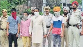  ?? SAMEER SEHGAL/HT ?? The accused in police custody in Amritsar on Monday.