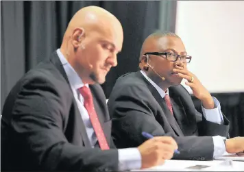  ?? PHOTO: ITUMELENG ENGLISH ?? Transnet chief executive officer Siyabonga Gama, right, announces the company’s financial results for the year to the end of March in Kempton Park yesterday. On the left is the company’s chief financial officer, Garry Pita.