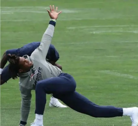  ?? COurtEsy OF NEW ENgLaNd PatrIOts ?? LOOSEN UP: Cam Newton stretches outside Gillette Stadium earlier this week.