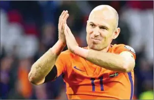  ?? EMMANUEL DUNAND/AFP ?? Netherland­s forward Arjen Robben acknowledg­es the crowd after their 2018 World Cup qualifier against Sweden in Amsterdam on Tuesday.