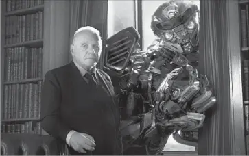  ?? Paramount Pictures/Bay Films ?? “TRANSFORME­RS: The Last Knight,” had a $217-million budget before marketing costs and will have to do huge business overseas to be a success. Above, Anthony Hopkins in a scene from the Paramount Pictures film.