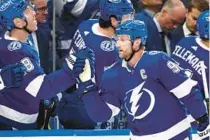  ?? JASON BEHNKEN/AP ?? Lightning center Steven Stamkos has just three goals over his last 21 games and is a minus-12 over that stretch entering Thursday’s match with the Devils.