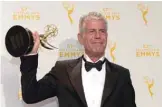  ??  ?? In this file photo taken on September 12, 2015 Chef Anthony Bourdain, winner of the award for outstandin­g informatio­nal series or special for “Anthony Bourdain Parts Unknown,” poses in the press room during the 2015 Creative Arts Emmy Awards at...