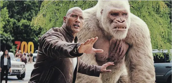  ?? WARNER BROS. ?? Dwayne Johnson and George in a scene from “Rampage.”