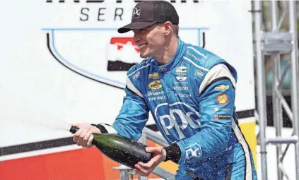  ?? PETER CASEY/USA TODAY SPORTS ?? Indycar driver Josef Newgarden celebrates winning the Grand Prix of St. Petersburg on Sunday.