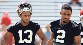  ?? BUTCH DILL/AP ?? Alabama quarterbac­ks Tua Tagovailoa (13) and Jalen Hurts (2) both could play in Saturday’s opener against Louisville.