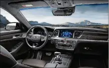  ?? GENESIS PHOTO ?? A 9.2-inch touchscree­n with navigation, heated steering wheel, 17-speaker audio system, and high-tech Apple CarPlay and Android Auto add to the car’s appeal.