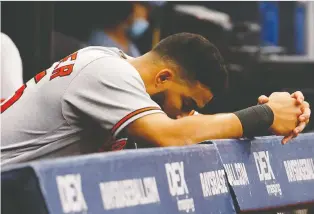  ?? DOUGLAS P. DEFELICE/GETTY IMAGES ?? Anthony Santander hangs his head after Baltimore lost 7-2 to the Tampa Bay Rays on Thursday at Tropicana Field in St Petersburg, Fla. It was the 15th straight loss for the Orioles (38-82) who have been outscored by an ugly 138-42 run count during that stretch.