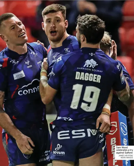  ?? JAMES HEATON/ NEWS IMAGES ?? Sam Wood celebrates a try against Salford