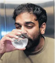  ?? ?? Feeling the heat . . . Otago Daily Times reporter Mark John takes on water during the Dunedin Chilli Eating Champs 2024 last night. Michael White was the eventual winner. PHOTOS: LINDA ROBERTSON