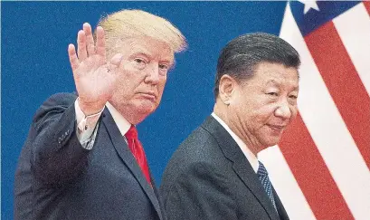  ?? NICOLAS ASFOURI AFP/GETTY IMAGES FILE PHOTO ?? Despite a tariff truce between U.S. President Donald Trump and China’s President Xi Jinping, market confidence remains fragile.