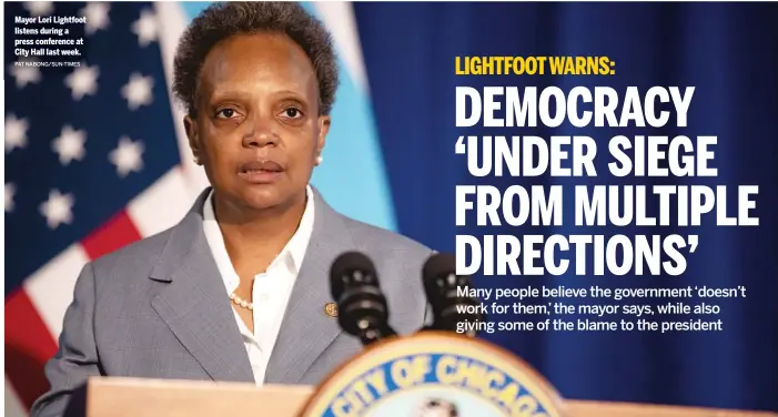  ?? PAT NABONG/SUN-TIMES ?? Mayor Lori Lightfoot listens during a press conference at City Hall last week.