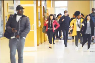  ?? Michael Cummo / Hearst Connecticu­t Media ?? Students walk through the concourse in the main building of the University of Connecticu­t’s campus, at 1 University Place, in downtown Stamford on April 5. Experts say although internship­s remain a critical career-developmen­t pathway for undergradu­ate...