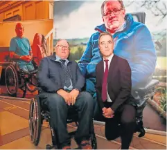  ?? PA WIRE ?? James Nesbitt with Robert Barfoot, who was paralysed in an IRA gun attack in 1985, and features in the new photograph­ic exhibition